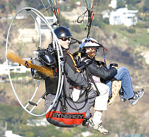 flying a paraglider tandem with the Synergy pa...